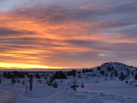 sunset over a snowy craters of the moon