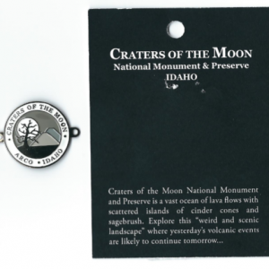 Craters of the Moon Hiking Stick Medallion on Interpretive Card