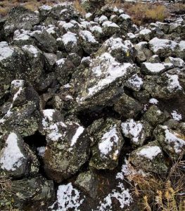 block lava lichen snow
